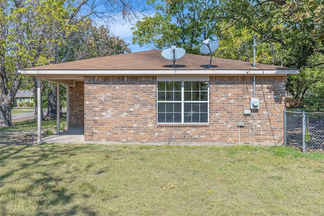 view of home's exterior featuring a lawn