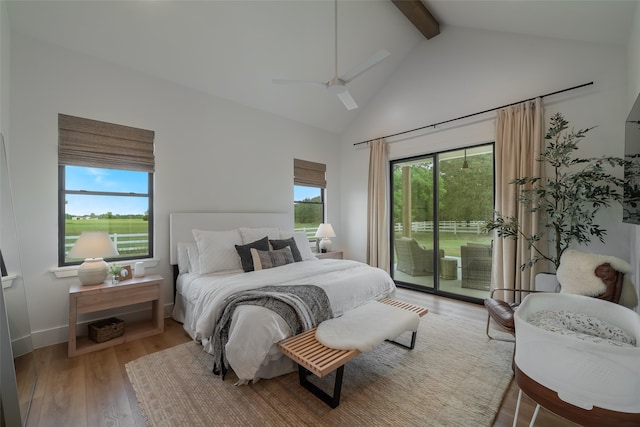 bedroom featuring high vaulted ceiling, hardwood / wood-style flooring, ceiling fan, access to exterior, and beamed ceiling