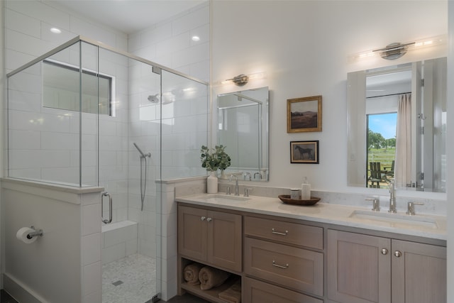 bathroom featuring vanity and walk in shower