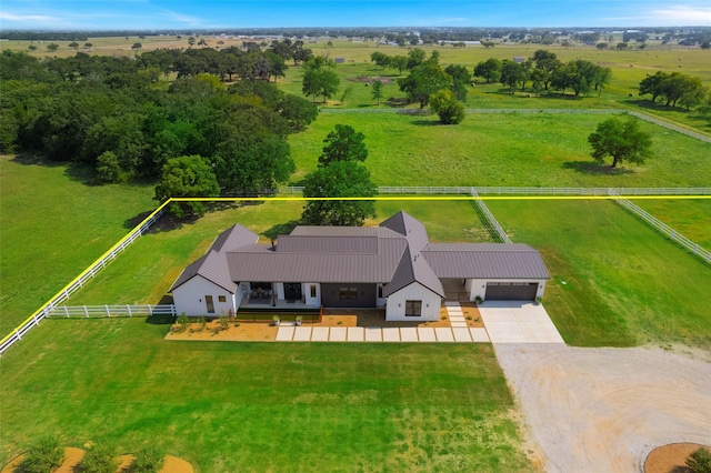 birds eye view of property featuring a rural view