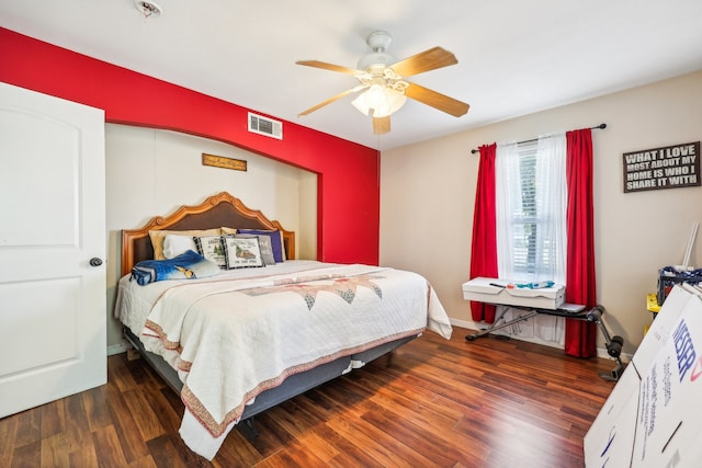 bedroom featuring ceiling fan and dark hardwood / wood-style flooring