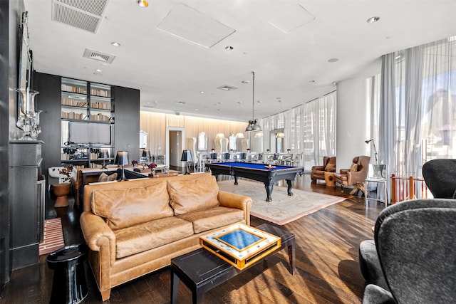 living room featuring wood-type flooring and billiards