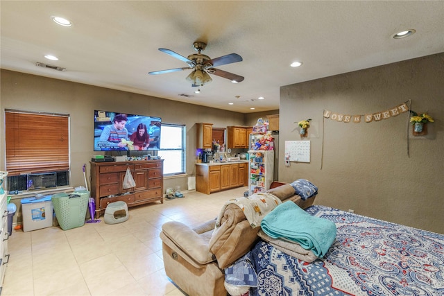 living room with cooling unit and ceiling fan