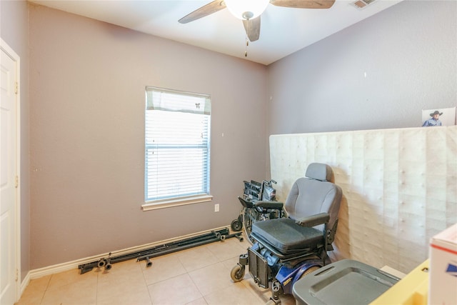 miscellaneous room featuring light tile patterned floors and ceiling fan