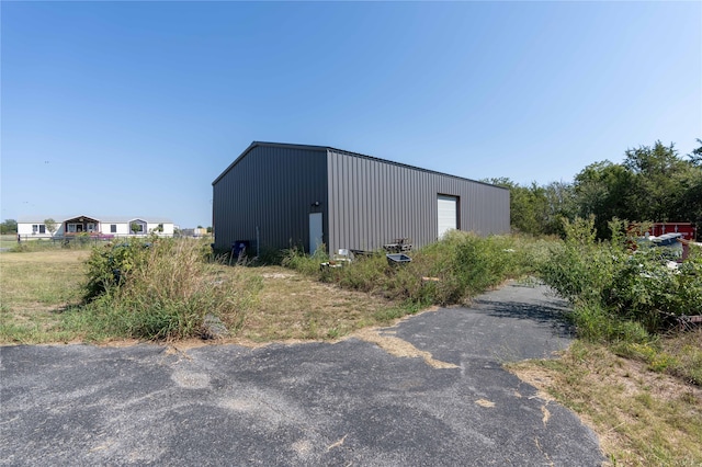 view of outdoor structure featuring a garage