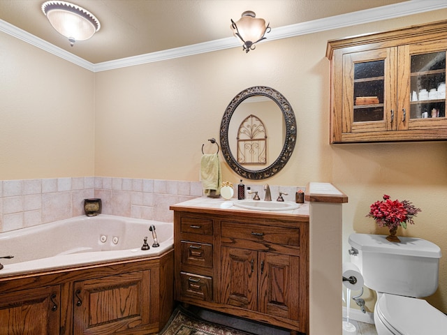 bathroom with vanity, a tub, ornamental molding, and toilet