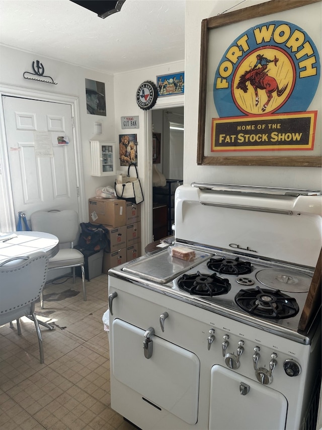 kitchen featuring white stove