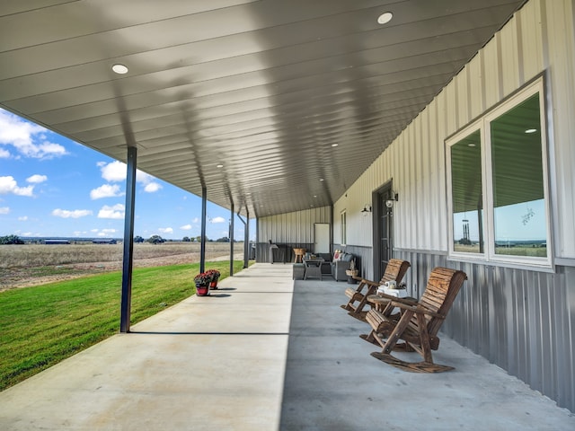 view of patio / terrace with a rural view