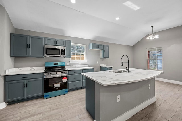 kitchen featuring stainless steel appliances, wood finish floors, vaulted ceiling, and a sink