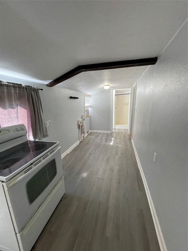 kitchen with white range with electric cooktop and hardwood / wood-style floors