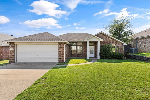 1108 E E Park, Lindale, TX 75771 - ranch-style house featuring a garage, a front yard, and brick siding