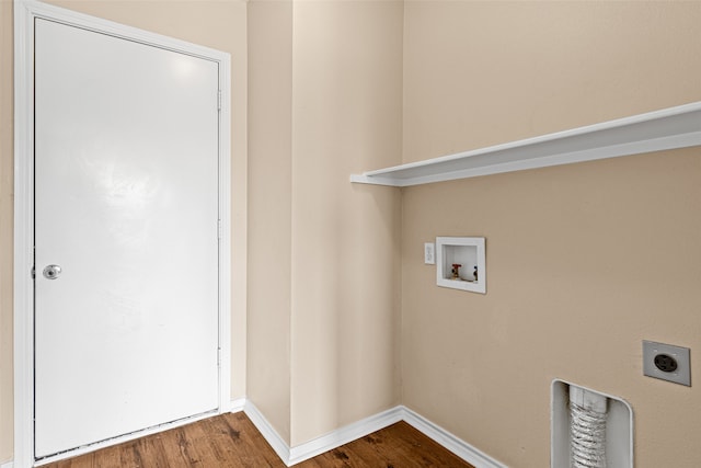 clothes washing area with wood-type flooring, hookup for a washing machine, and electric dryer hookup