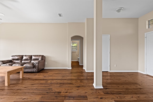 living room with dark hardwood / wood-style floors