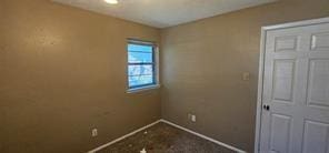 149 NW Suzanne Ter, Burleson, TX 76028 - unfurnished bedroom with baseboards