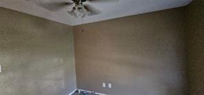 149 NW Suzanne Ter, Burleson, TX 76028 - unfurnished room with a ceiling fan