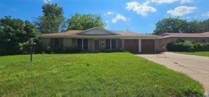 149 NW Suzanne Ter, Burleson, TX 76028 - ranch-style home with a front yard, a garage, and concrete driveway
