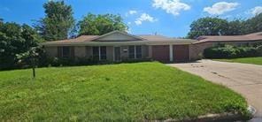 149 NW Suzanne Ter, Burleson, TX 76028 - ranch-style home featuring a garage, a front lawn, and concrete driveway