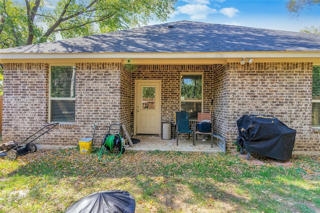 rear view of house with a patio