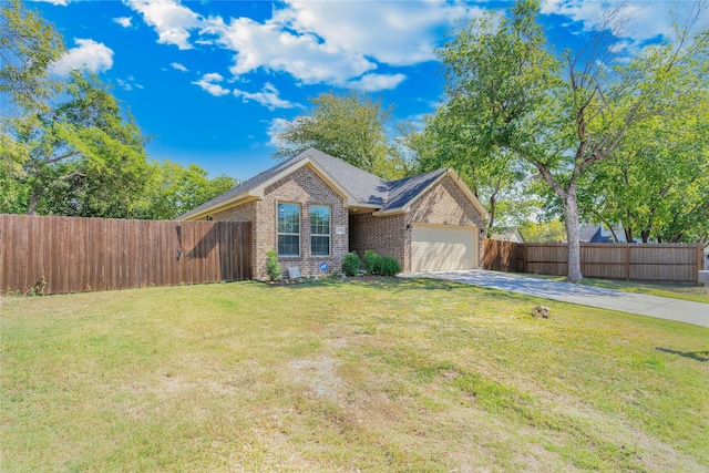 ranch-style home featuring a garage and a front yard