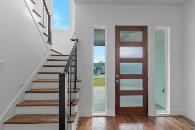 foyer entrance featuring hardwood / wood-style flooring