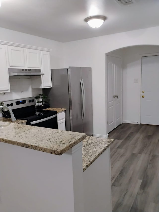 kitchen with white cabinetry, electric stove, light stone counters, and light wood-type flooring