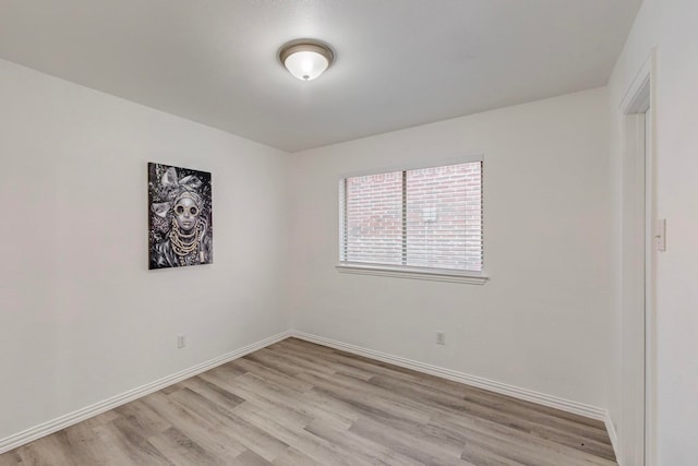 empty room featuring light hardwood / wood-style floors