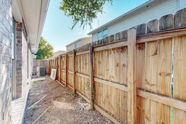 view of yard featuring central AC unit