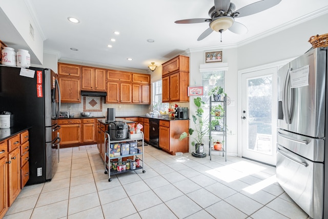 kitchen featuring light tile patterned floors, crown molding, stainless steel fridge, and decorative backsplash