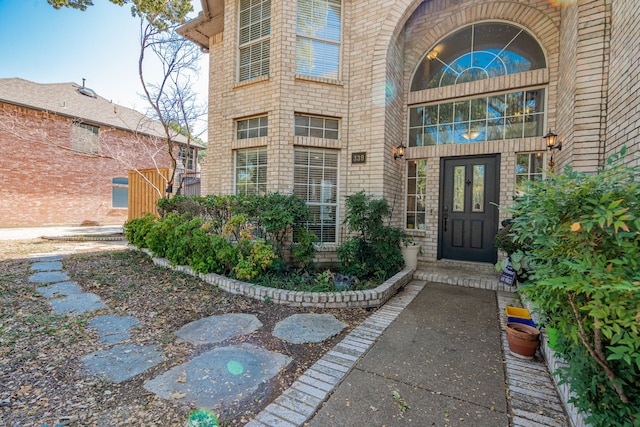 doorway to property featuring a balcony