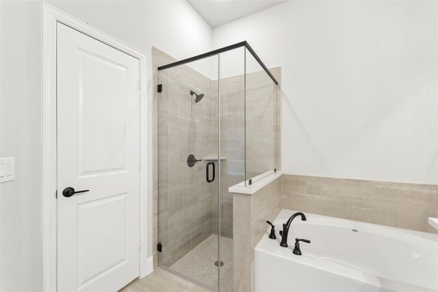 bathroom featuring plus walk in shower