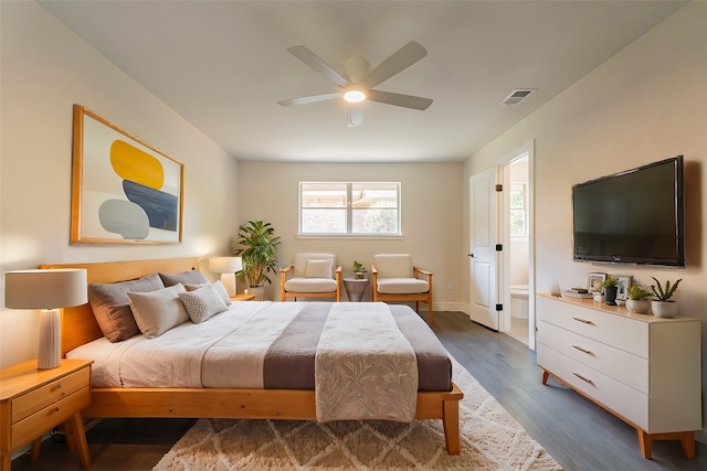 bedroom with ceiling fan and dark hardwood / wood-style floors