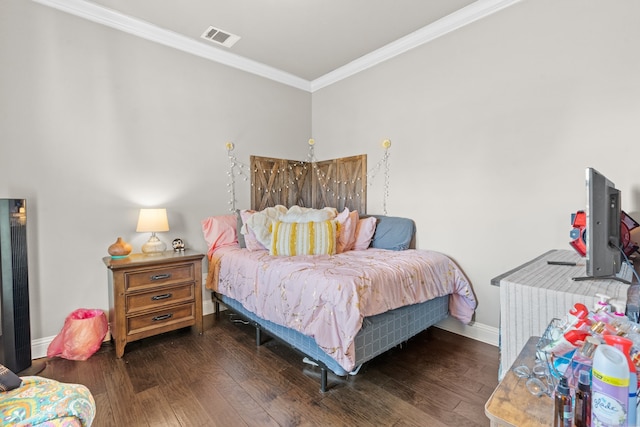 bedroom featuring dark hardwood / wood-style floors and ornamental molding