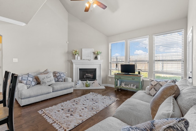 living room featuring high vaulted ceiling, dark hardwood / wood-style flooring, and ceiling fan