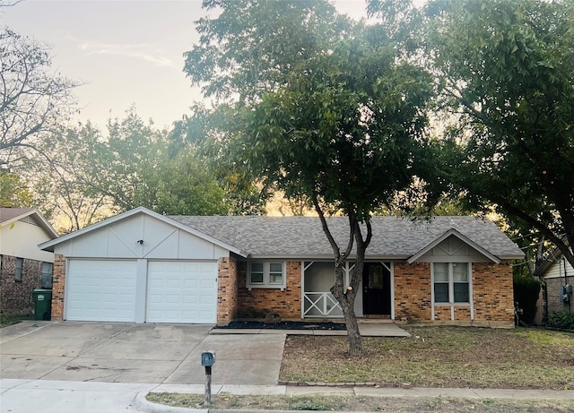 single story home featuring a garage