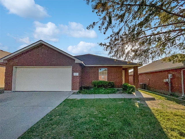 view of front of house with a garage and a front lawn