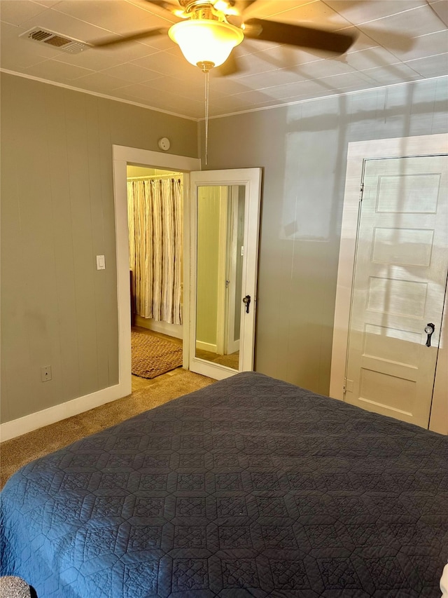 unfurnished bedroom featuring carpet floors and ceiling fan