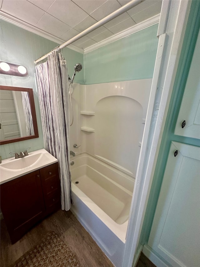 bathroom with vanity, ornamental molding, shower / bath combo, and wood-type flooring