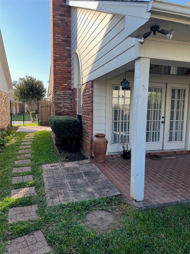 exterior space with french doors and a patio area