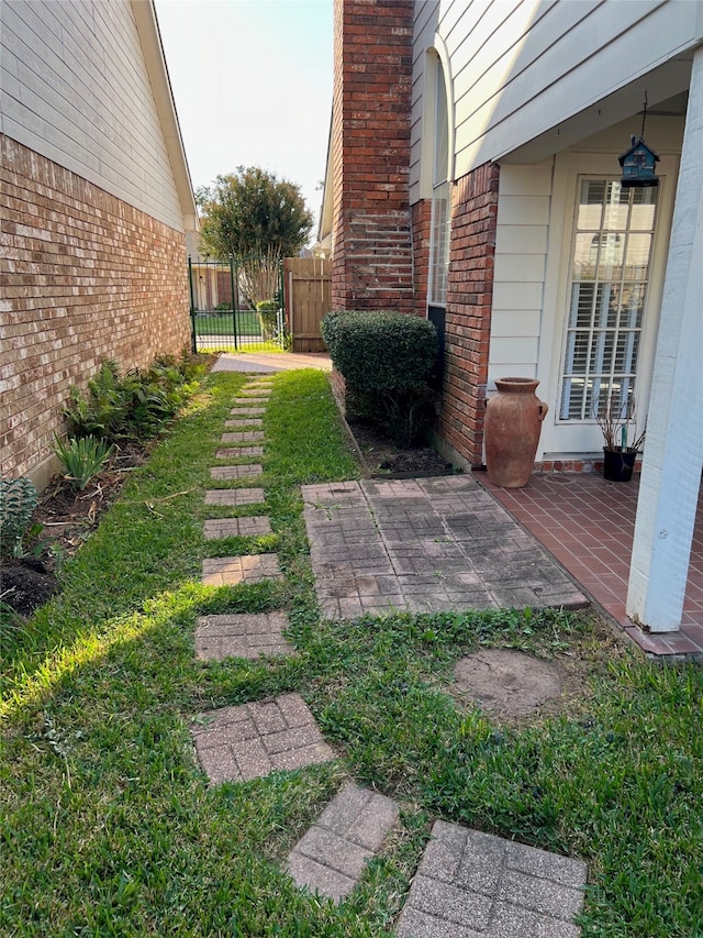 view of yard with a patio area