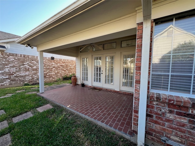 view of patio with ceiling fan and french doors