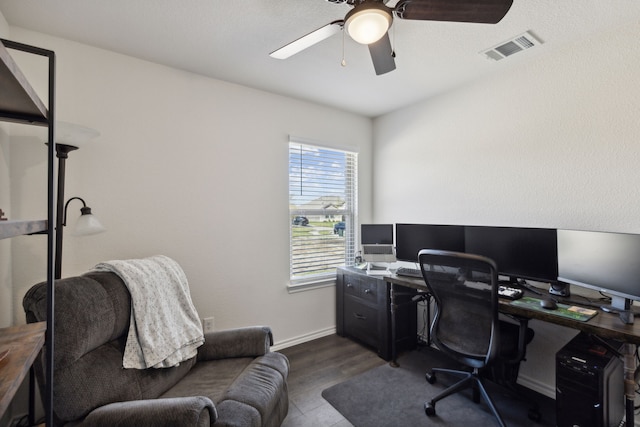 office area featuring ceiling fan and dark hardwood / wood-style flooring