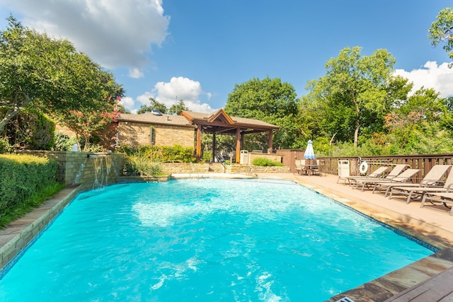 5616 Preston Oaks Rd Unit 1403, Dallas, TX 75254 - view of swimming pool featuring a wooden deck and a gazebo