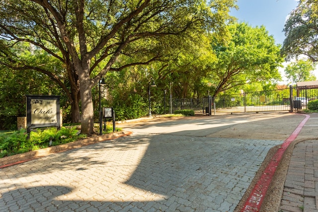 5616 Preston Oaks Rd Unit 1403, Dallas, TX 75254 - view of property's community featuring a gate