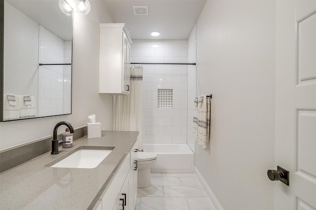 full bathroom with tiled shower / bath combo, vanity, and toilet