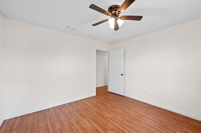 unfurnished room with ceiling fan and light hardwood / wood-style flooring