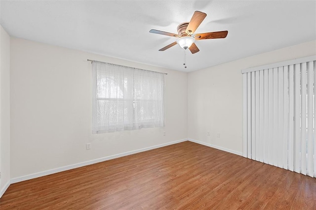 unfurnished bedroom with hardwood / wood-style flooring and ceiling fan