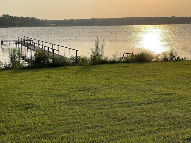 exterior space with a water view