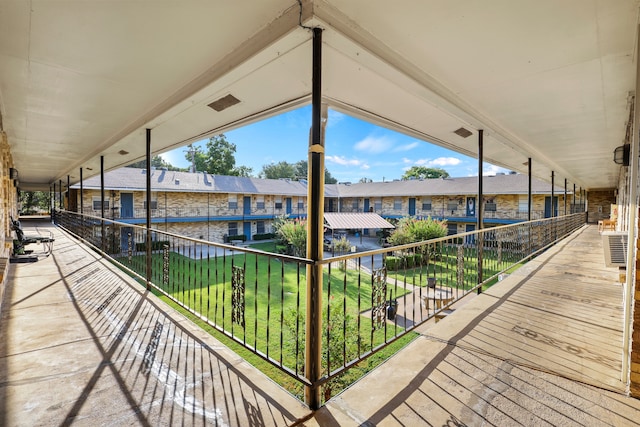 view of patio with a balcony