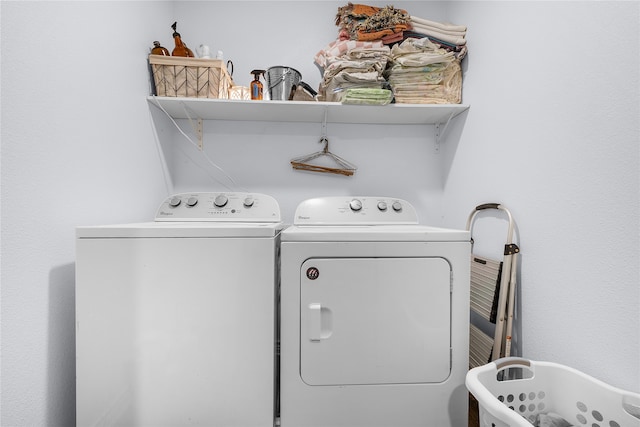 laundry room featuring washer and clothes dryer