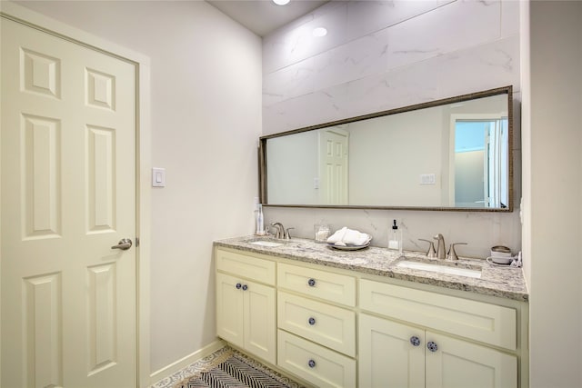 bathroom with vanity and tile patterned floors